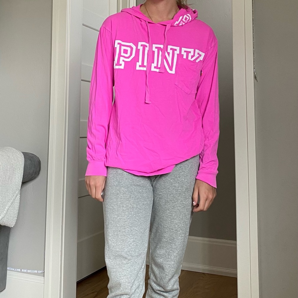 Pink hoodie.